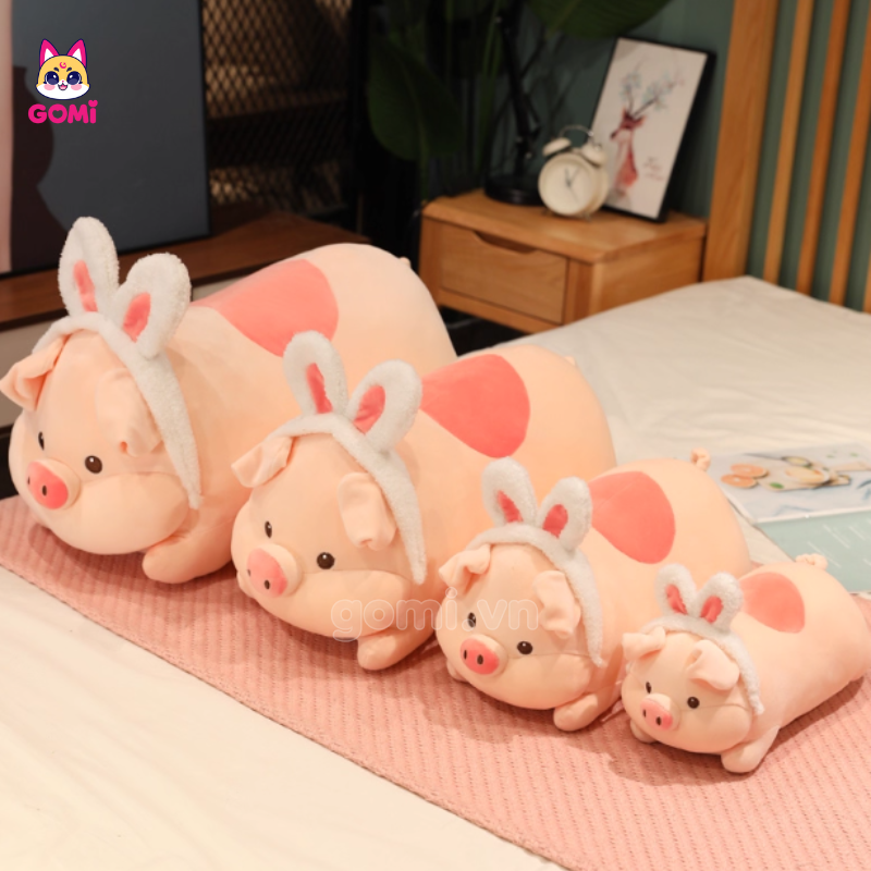 Gấu Bông Heo Nằm Tai Thú