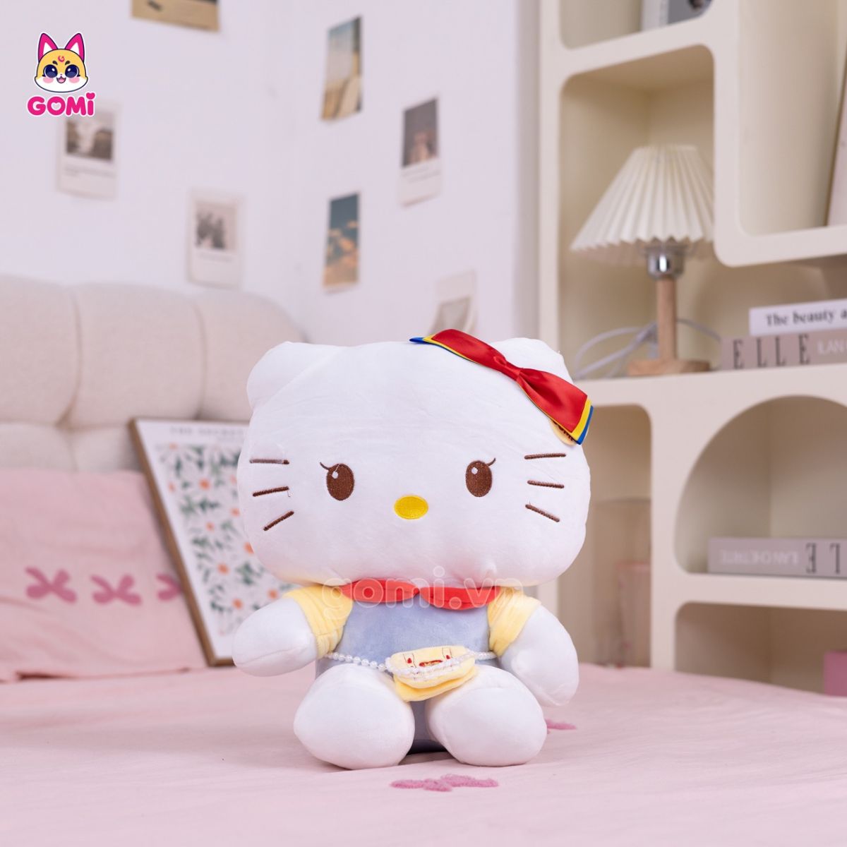 Gấu Bông Kitty Đeo Túi Vàng