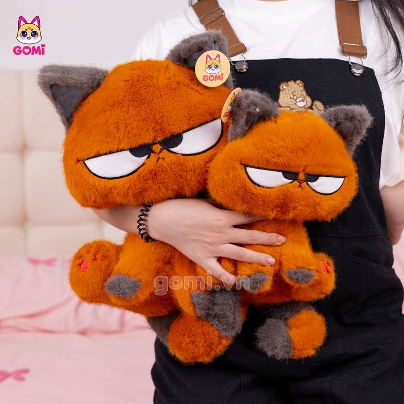 Gấu Bông Mèo Cam Mắt Liếc