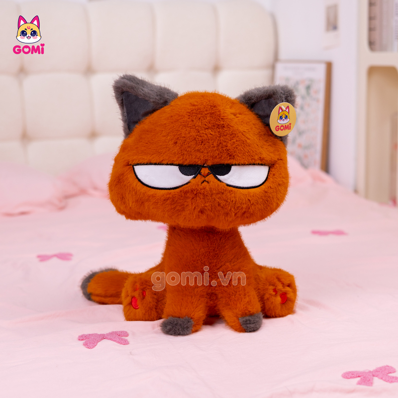 Gấu Bông Mèo Cam Mắt Liếc