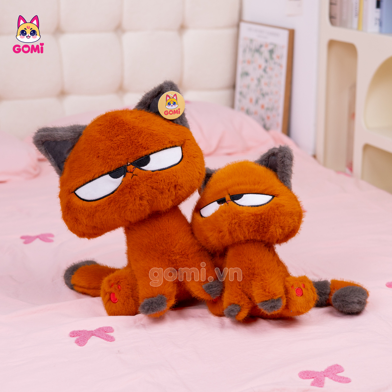 Gấu Bông Mèo Cam Mắt Liếc