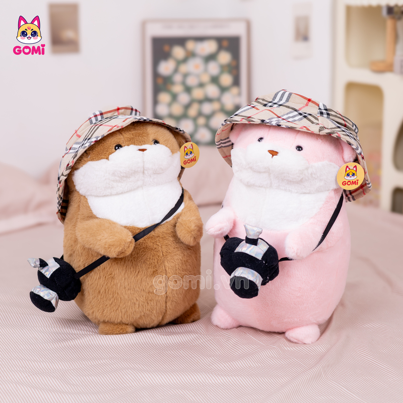 Gấu Bông Rái Cá Đeo Máy Ảnh