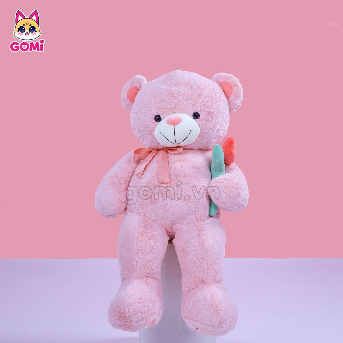 Gấu Bông Teddy Nơ Cầm Hoa