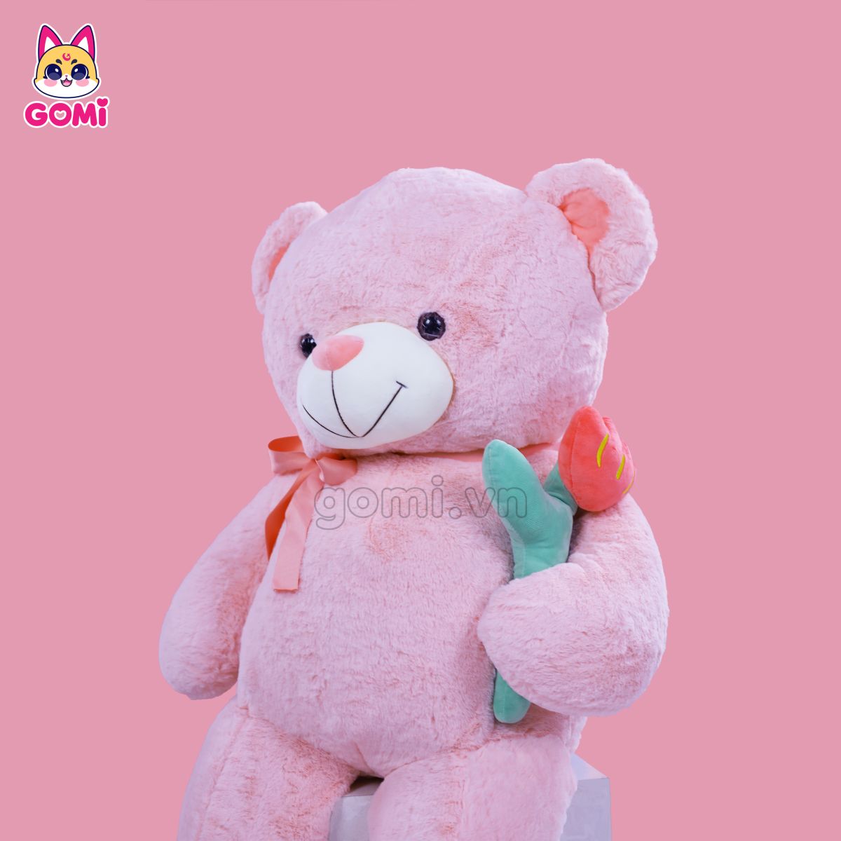 Gấu Bông Teddy Nơ Cầm Hoa