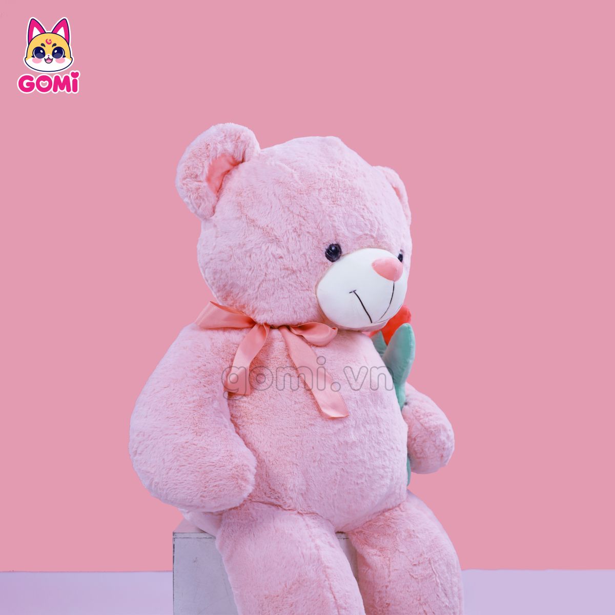 Gấu Bông Teddy Nơ Cầm Hoa