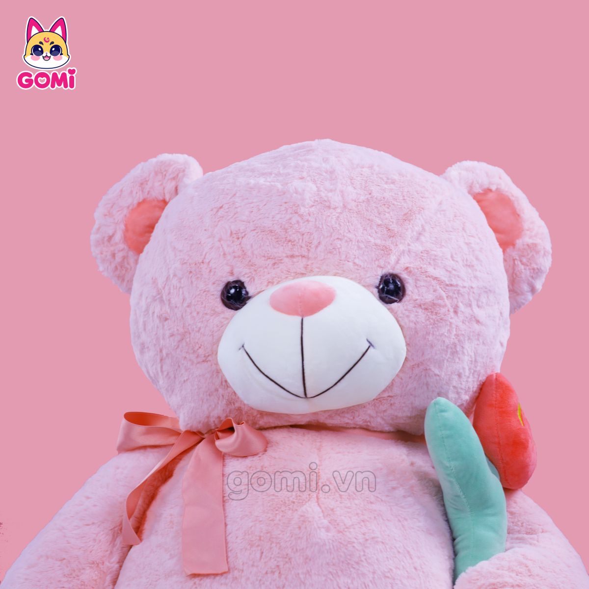 Gấu Bông Teddy Nơ Cầm Hoa