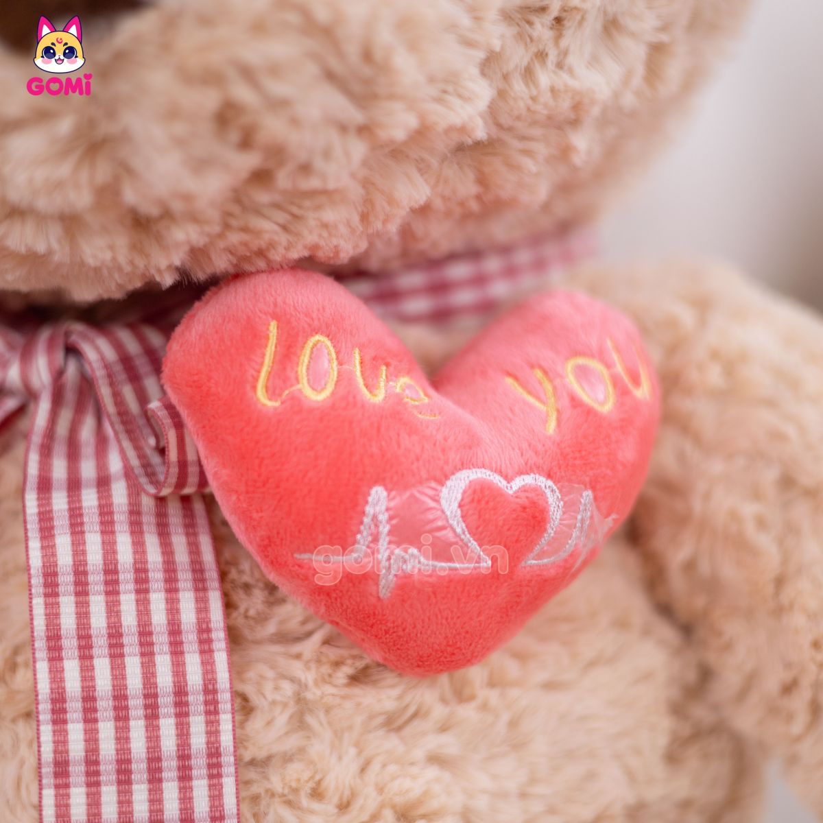 Gấu Bông Teddy Nơ Tim Rút