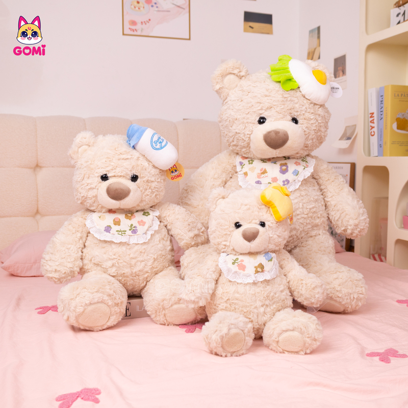 Gấu Bông Teddy Đeo Yếm Hoa Đội Mũ