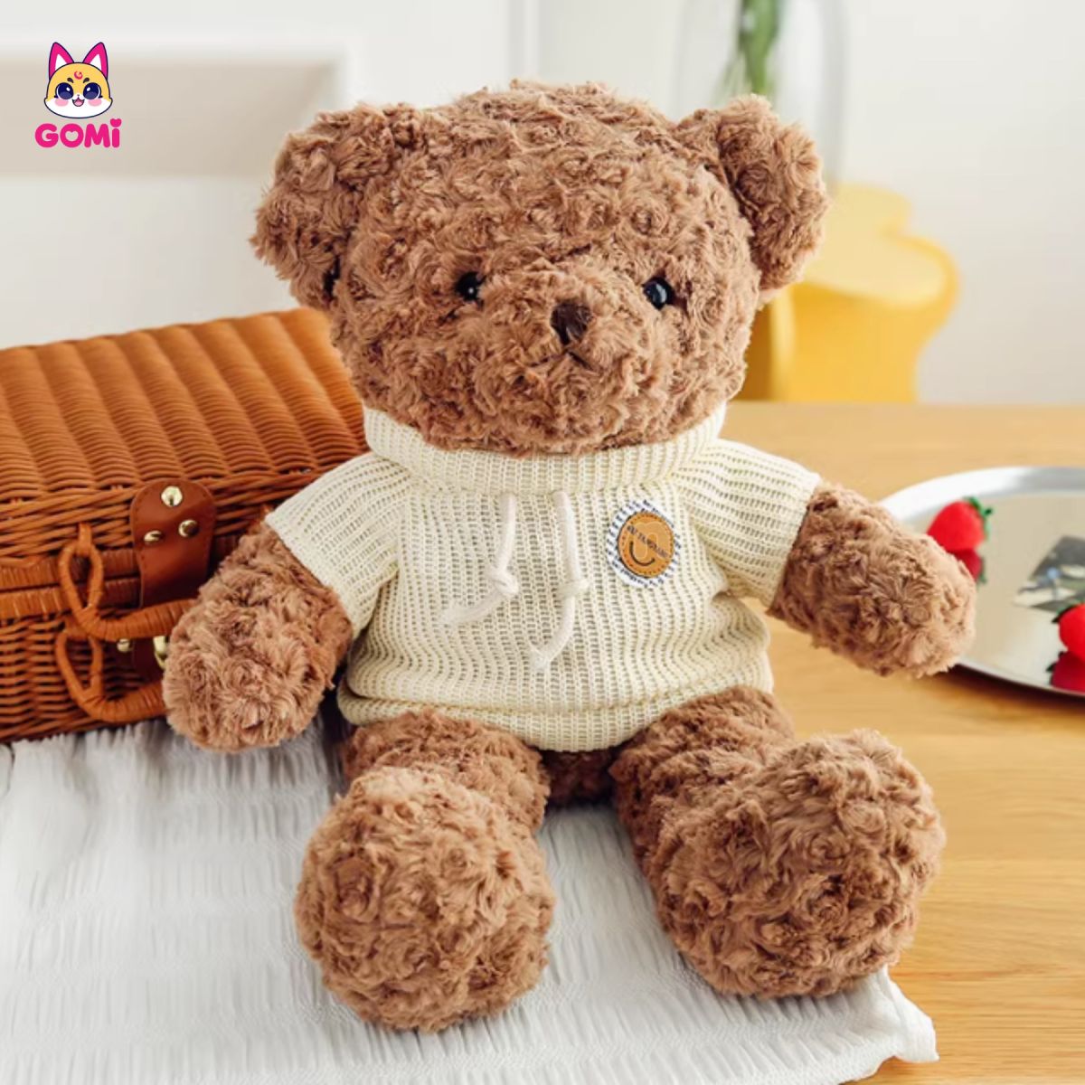 Gấu Bông Teddy Lông Xoắn Áo Logo Da