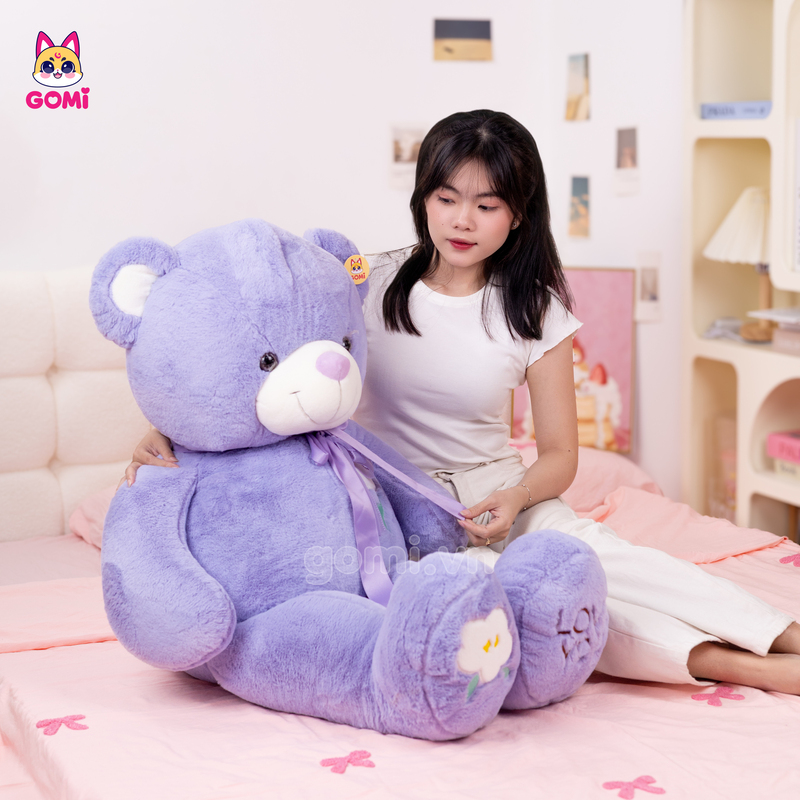 Gấu Bông Teddy Ngực Cành Hoa