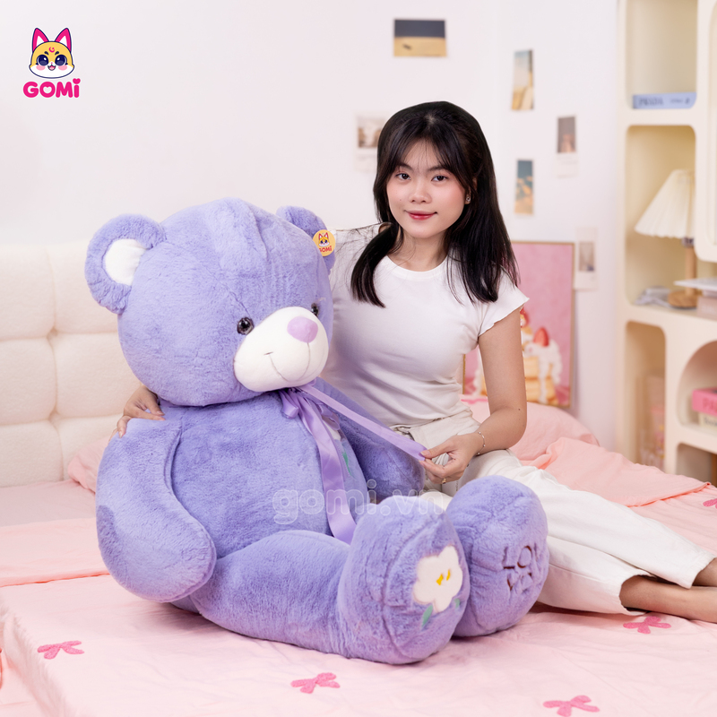 Gấu Bông Teddy Ngực Cành Hoa