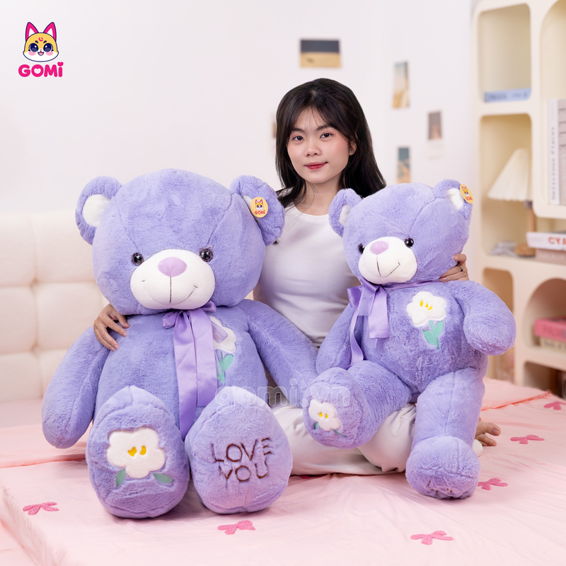 Gấu Bông Teddy Ngực Cành Hoa