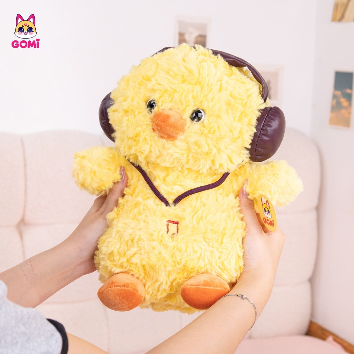 Gấu Bông Vịt Vàng Đeo Tai Nghe